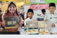 Siswi MI Roudlotun Nasyi’in menunjukkan uang tunai doorprize “Jumat Berkah” yang diterimanya dari SPPG Lopang Kembangbahu, Lamongan. (Foto Dok Ho/RadarBangsa.co.id) 