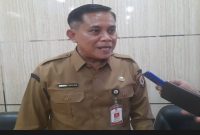 Kepala Dispendukcapil Jember, Bambang Saputro, S.H., M.Si., saat diwawancarai wartawan usai rapat kerja bersama Komisi A DPRD Jember, Selasa (10/2/2026). (Foto Dok Ho/RadarBangsa.co.id)