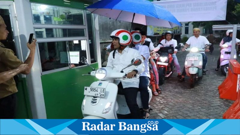 Bupati Bangkalan Lukman Hakim bersama Wakil Bupati Moh. Fauzan Ja’far saat launching parkir non tunai di RSUD Syamrabu Bangkalan, Rabu (11/3). (Foto Dok Ho/RadarBangsa.co.id)