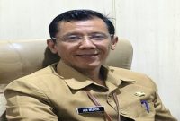 Kepala Dinas Pemberdayaan Masyarakat dan Desa (DPMD) Kabupaten Jember, Adi Wijaya, memberikan keterangan terkait solusi Perkades APBDes untuk memulihkan layanan Desa Patemon, Senin (2/3/2026). (Foto Dok Ho/RadarBangsa.co.id)