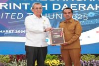 Bupati Bangkalan menyerahkan LKPD 2025 ke BPK Jatim, Senin (30/3/2026) (Foto Dok Ho/RadarBangsa.co.id)
