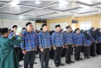 Sekda Musi Rawas Utara memimpin Pelantikan PNS dan Pengukuhan CPNS, Jumat (27/2/2026). (Foto Dok Ho/RadarBangsa.co.id)