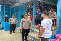 Personel Polres Pelalawan saat pengamanan di Tarina Boom, Minggu (22/3/2026) (Foto Dok Ho/RadarBangsa.co.id)