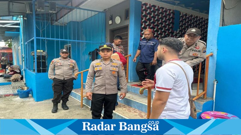 Personel Polres Pelalawan saat pengamanan di Tarina Boom, Minggu (22/3/2026) (Foto Dok Ho/RadarBangsa.co.id)