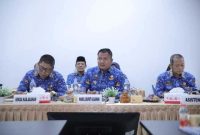 Wakil Bupati Asahan memimpin RakorPem di aula Dinas Kesehatan, Jumat (17/4/2026). (Foto Dok Ho/RadarBangsa.co.id)