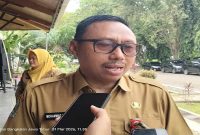 Plt Kepala Bappeda Provinsi Jawa Timur, Moh. Yasin, saat menyampaikan pernyataan pada forum Musrenbang RKPD 2027 di Pendopo Pratanu Bangkalan, Selasa (31/3/2026). (Foto Dok Ho/RadarBangsa.co.id)