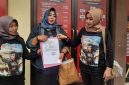 Wali murid atlet muda didampingi GM FKPPI Jember saat melapor ke Polres Jember, Senin (5/5/2026). (Foto Dok Ho/RadarBangsa.co.id)