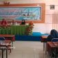 Disperinaker Bangkalan menggelar sosialisasi peluang kerja luar negeri di SMKN 1 Arosbaya, Rabu, 7 Mei 2026. (Foto Dok Ho/RadarBangsa.co.id)