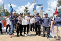 Buruh SPSI bersama Polres Lubuk Linggau membagikan paket makanan kepada warga, Jumat (1/5/2026). (Foto Dok Ho/RadarBangsa.co.id)