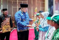 Bupati Pasuruan Rusdi Sutejo menghadiri penyerahan penghargaan Olimpiade MI tingkat Kabupaten Pasuruan di Auditorium Mpu Sindok, Rabu (17/6/2026). (Foto Dok Ho/RadarBangsa.co.id)