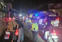 Suasana penyambutan jamaah haji Kloter 32 KBIH Ar-Roudloh di Gedung MTs Wahid Hasyim, Kecamatan Tikung, Lamongan. Selasa, 9 Juni 2026 (Foto Dok Ho/RadarBangsa.co.id)