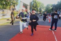 Sebanyak 2.735 peserta mengikuti Prabu Fun Run 6K dalam rangka HUT ke-80 Bhayangkara di depan Polres Probolinggo Kota, Minggu (21/6/2026). (Foto Dok Ho/RadarBangsa.co.id)