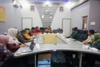Jajaran Diskominfo Bangkalan menerima kunjungan kerja dan benchmarking Diskominfo Kabupaten Malang di Kantor Diskominfo Bangkalan, Kamis (30/7/2026). (Foto Dok Ho/RadarBangsa.co.id)