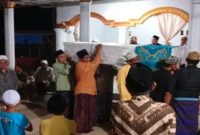 Jenazah PMI asal Desa Lerpak, Bangkalan, tiba di rumah duka setelah difasilitasi pemulangannya dari Malaysia, Minggu (19/7/2026). (Foto Dok Ho/RadarBangsa.co.id)