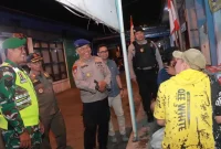 Personel Polres Lamongan melaksanakan patroli gabungan skala besar di sejumlah titik Kabupaten Lamongan, Jumat (21/8) malam. (Foto Dok Ho/RadarBangsa.co.id)