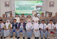 Waka Polres Pelalawan Kompol Asep Rahmad saat memberikan pembekalan Program Bhuwana Lestari di Aula Teluk Meranti Polres Pelalawan, Rabu (12/8/2026). (Foto Dok Ho/RadarBangsa.co.id)