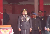 Dirreskrimsus Polda Riau Kombes Pol Ade Kuncoro Ridwan memimpin upacara HUT ke-81 RI di Lapangan Astaka Kantor Camat Bandar Sei Kijang, Senin (17/8/2026). (Foto Dok Ho/RadarBangsa.co.id)
