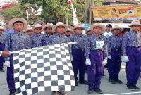 Tim putra dan putri SDN Sumberbendo mengikuti Gerak Jalan Perjuangan “Mantup Perjuangan” di Kecamatan Mantup, Sabtu (8/8/2026). (Foto Dok Ho/RadarBangsa.co.id)