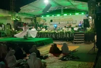 Personel Polsek Laren melaksanakan pengamanan pengajian Maulid Nabi Muhammad SAW di Ponpes Babul Khoir, Sabtu (19/9/2026). (Dok. Ho/RadarBangsa.co.id)