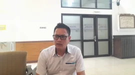 Kepala Perum Bulog Kantor Cabang Jember, Ade Saputra, menyampaikan komitmen Bulog untuk terus menyerap gabah petani hingga akhir 2026 meski target penyerapan telah terlampaui. (Dok. Ho/RadarBangsa.co.id)