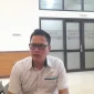 Kepala Perum Bulog Kantor Cabang Jember, Ade Saputra, menyampaikan komitmen Bulog untuk terus menyerap gabah petani hingga akhir 2026 meski target penyerapan telah terlampaui. (Dok. Ho/RadarBangsa.co.id)