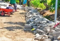 Perbaikan jalan paving di Desa Banjarkejen, Kecamatan Pandaan, Kabupaten Pasuruan, mulai dilakukan pada Jumat (16/10/2026). (Dok. Ho/RadarBangsa.co.id)