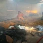 Petugas saat memadamkan kebakaran gudang tembakau di Desa Ganggangtingan, Ngimbang, Lamongan, Rabu (30/9/2026). (Dok. Ho/RadarBangsa.co.id)