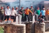 Kegiatan normalisasi DAM Pettesan bersama unsur Muspika, organisasi kemasyarakatan, pemerintah desa, dan warga di Kecamatan Sepulu, Bangkalan, Sabtu (17/10/2026). (Dok. Ho/RadarBangsa.co.id)