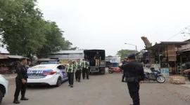 Personel Polres Lamongan melaksanakan kegiatan preventif dalam Operasi Patuh Semeru 2026. (Dok. Ho/RadarBangsa.co.id).